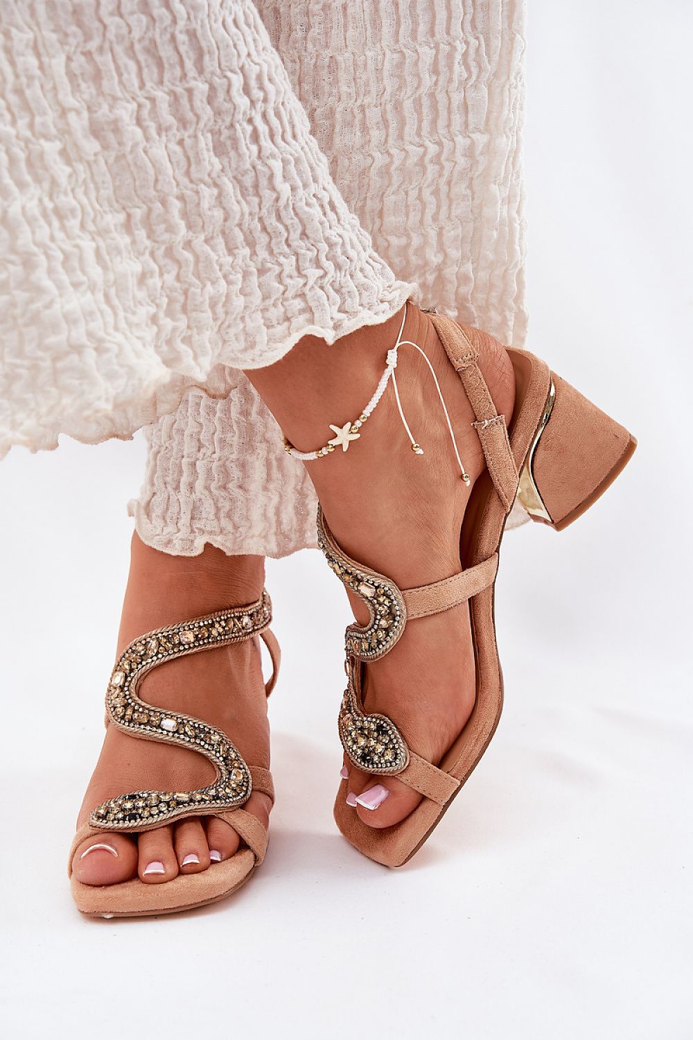 Stylish women's sandals from Step in Style, showcasing a beautiful snake pattern in crystals on eco suede, ideal for upscale events.