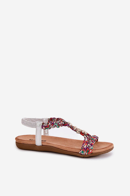 Close-up of Step in Style's luxury women's sandals showcasing the intricate woven strap design and zircon embellishments, perfect for summer outings.