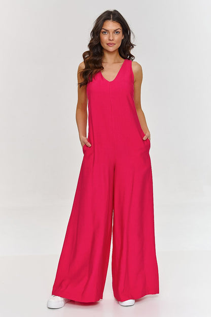 Luxurious Makadamia jumpsuit with wide legs and a flattering V-neckline, ideal for both casual outings and formal events.