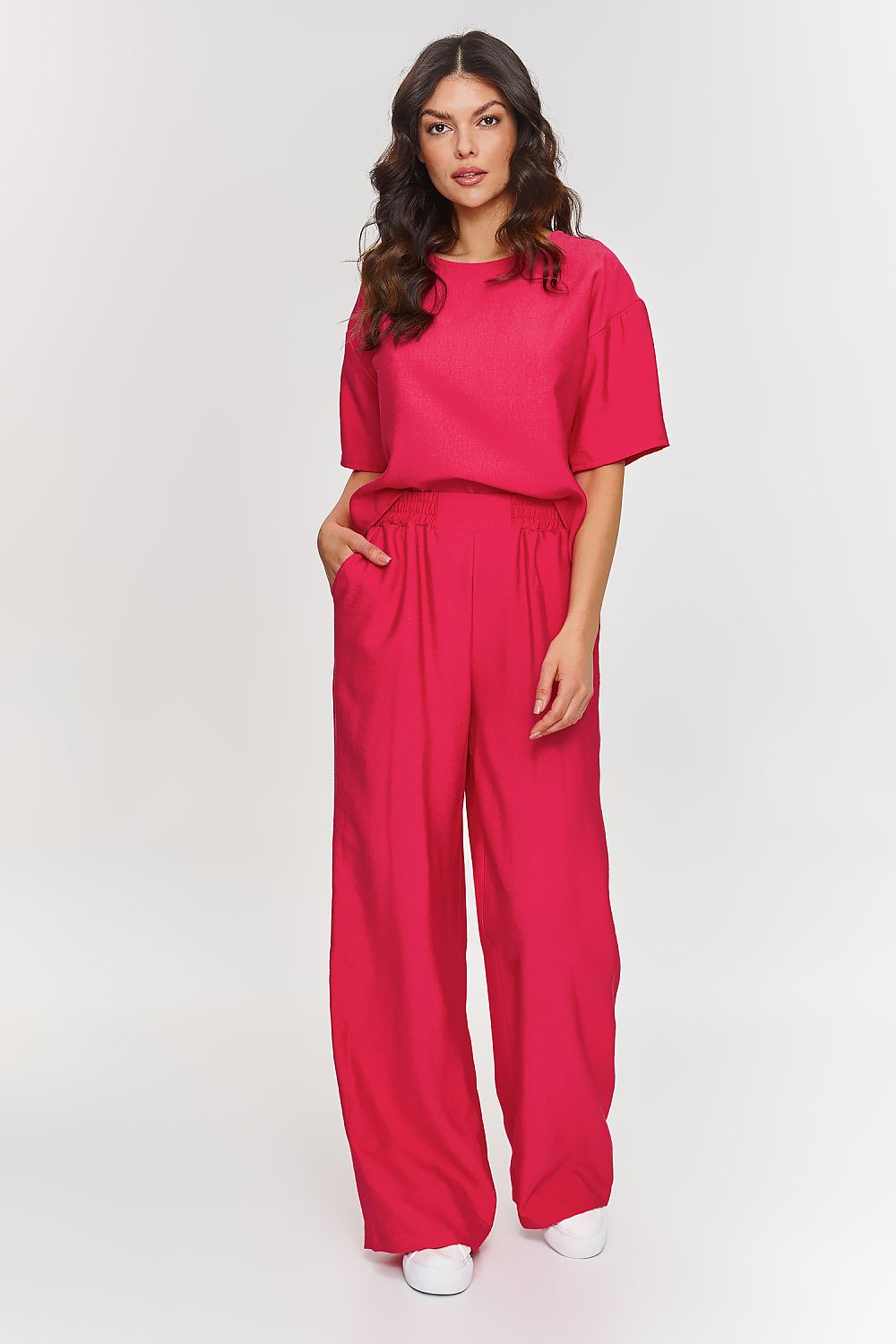 Wide angle of the Makadamia 2-Piece Set featuring a loose-fitting blouse and wide leg trousers, perfect for chic business meetings or elegant social gatherings.