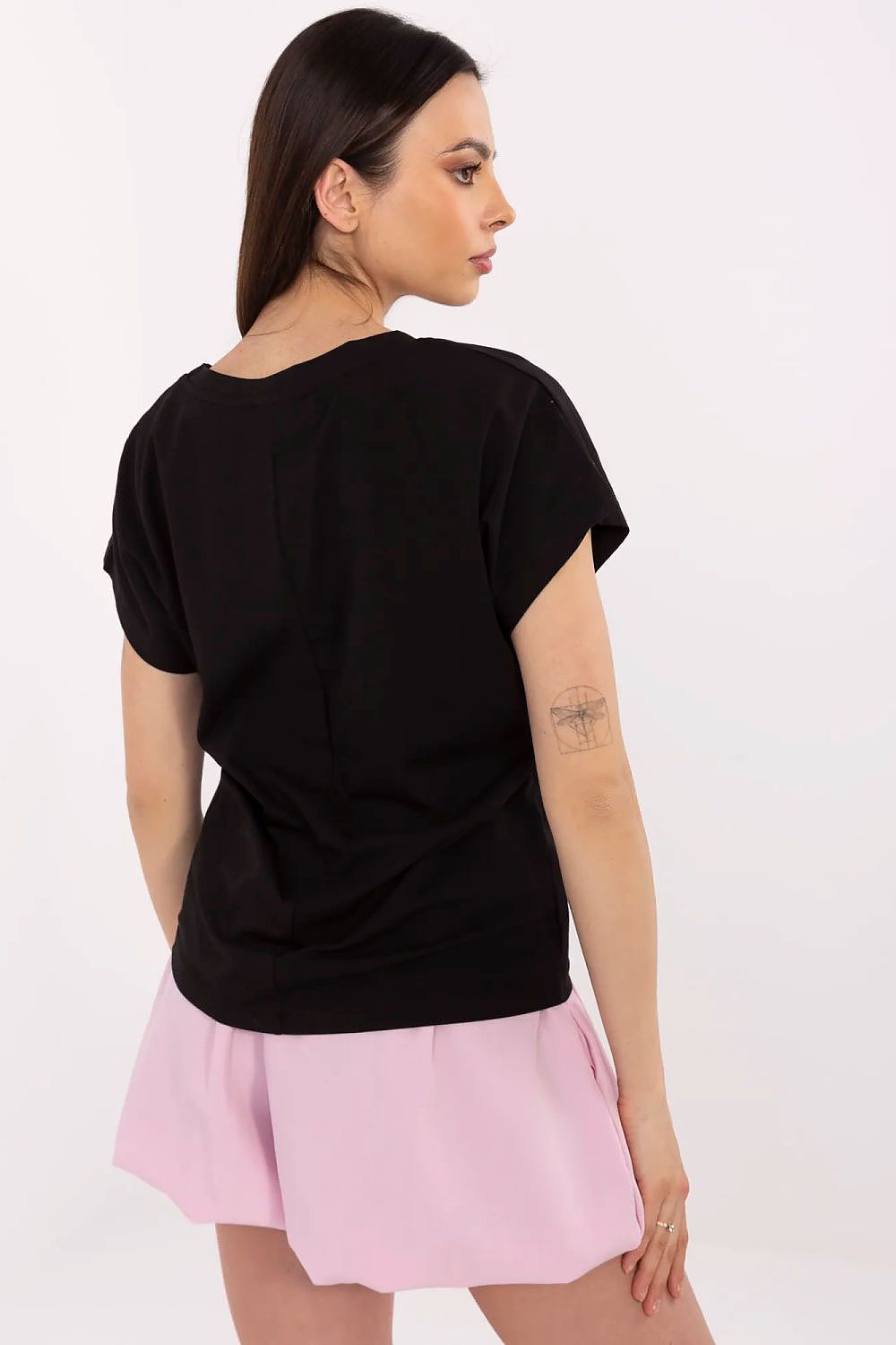 Model wearing an elegant cotton t-shirt with zircon decorations from Factory Price, demonstrating its perfect fit and stylish appeal for everyday comfort.