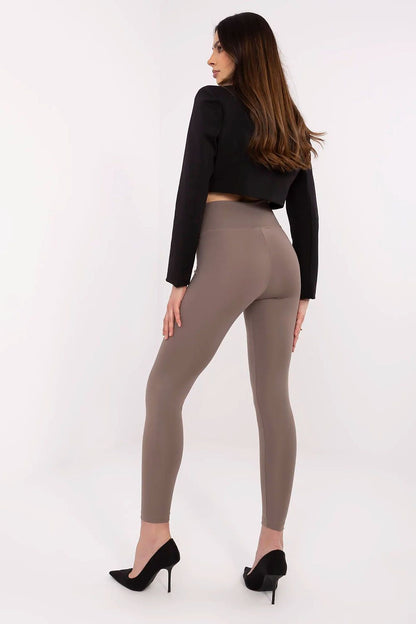Luxurious long leggings emphasizing feminine silhouette, crafted from premium polyester and elastane blend by Factory Price.