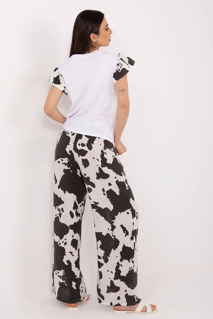 High-waisted wide-leg pants set by Italy Moda, offering comfort and elegance, ideal for casual and sophisticated occasions.