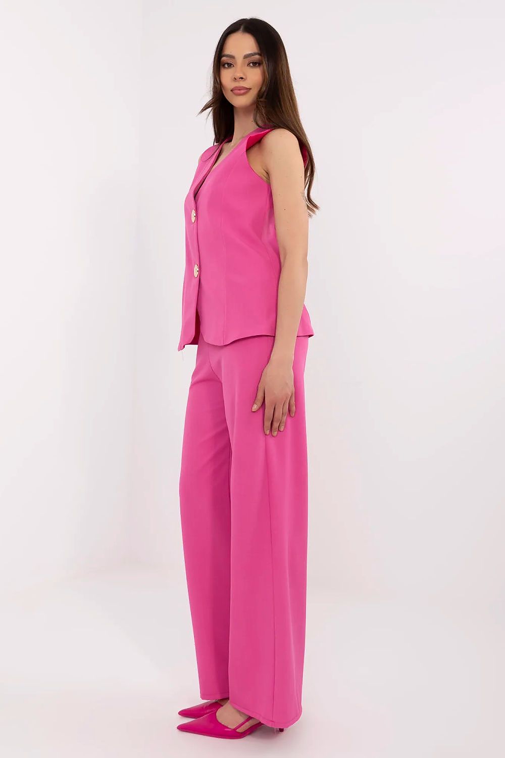 Close-up of the luxurious fabric of the elegant women's vest and high-waisted pants set by Italy Moda, highlighting the soft polyester blend that ensures comfort and style.