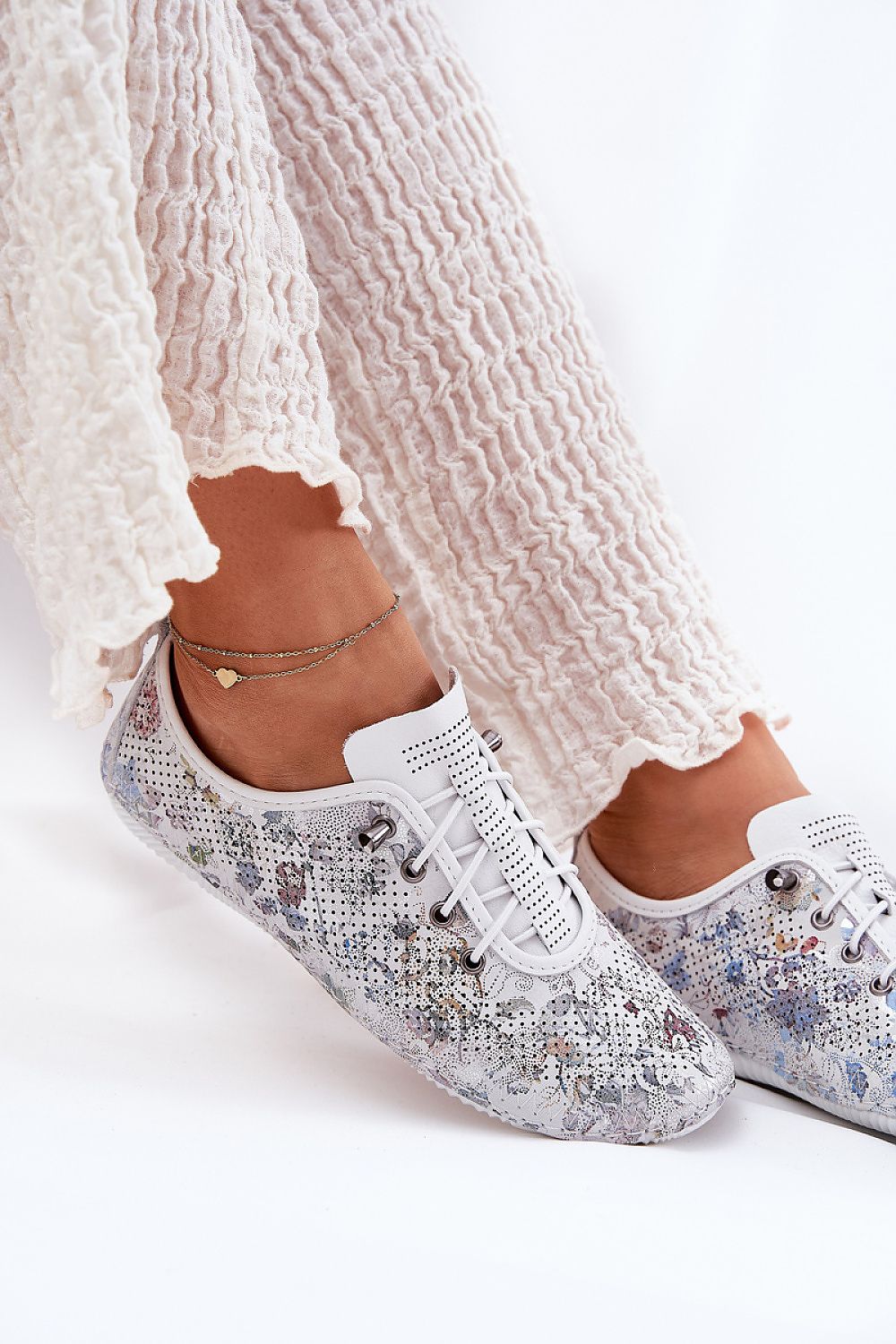 Elegant women's leather loafers from Step in Style, featuring a comfortable slip-on design with elastic bands and a luxurious finish.