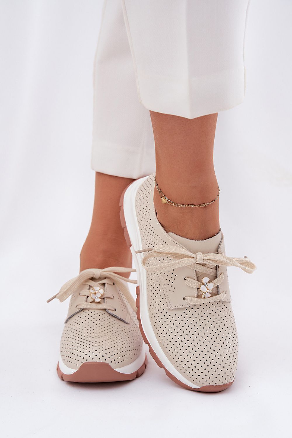 Elegant natural leather women's sports-style half shoes by Step in Style, featuring charming flower-shaped lace accents and a comfortable design ideal for all-day wear, available in sizes EU 36-41.