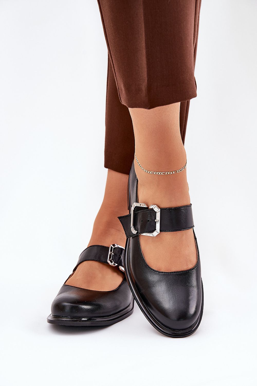 Step in Style elegant women's leather shoes with sophisticated buckle detail, perfect for both casual and formal outfits.