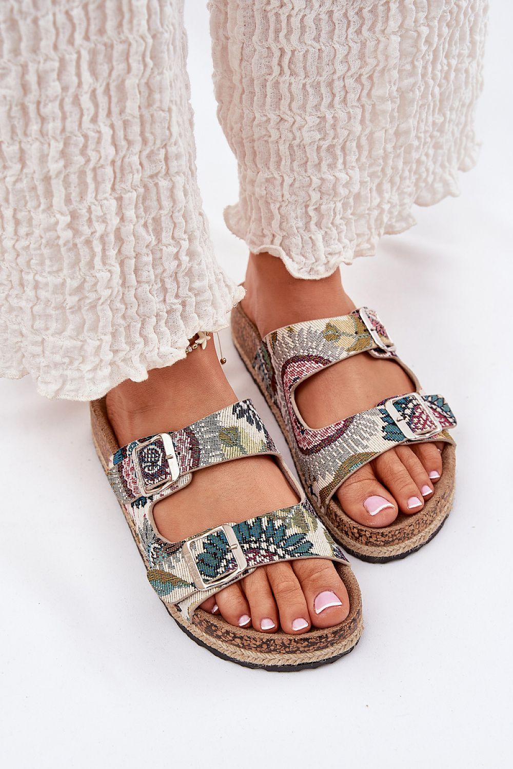 High-quality women's Lee Cooper flip-flops featuring a cushioned footbed and cork platform, perfect summer footwear from Step in Style.