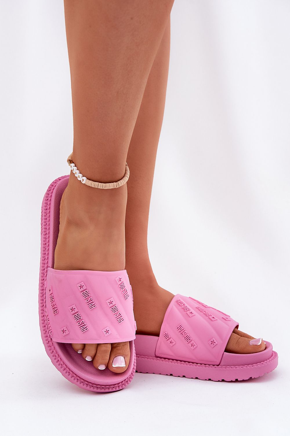 Elegant display of Women’s Big Star stylish platform flip-flops, highlighting their chic design and comfort for the discerning summer enthusiast.