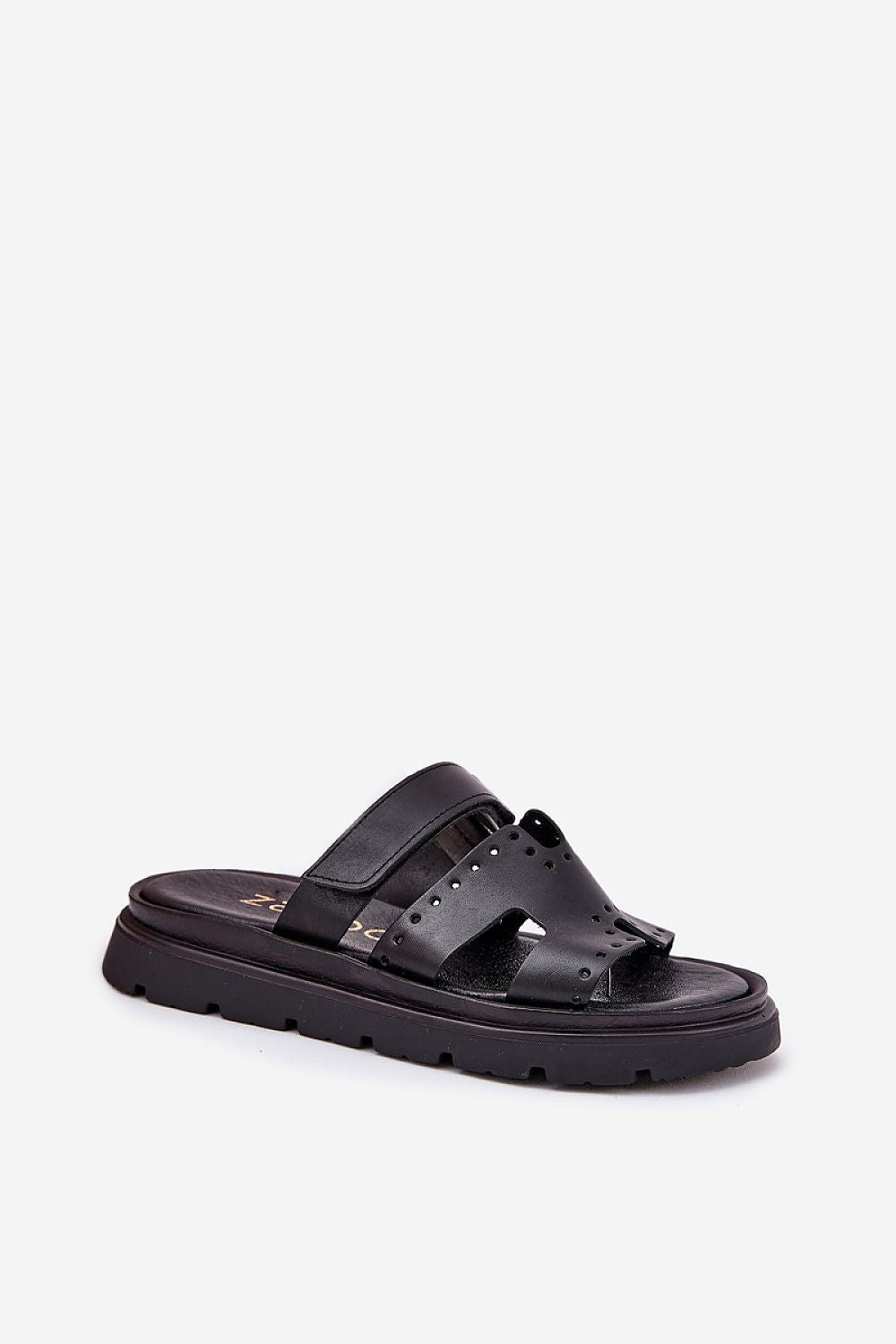 Stylish women's leather sandals from Step in Style, showcasing a modern design with a secure velcro strap, perfect for summer elegance.