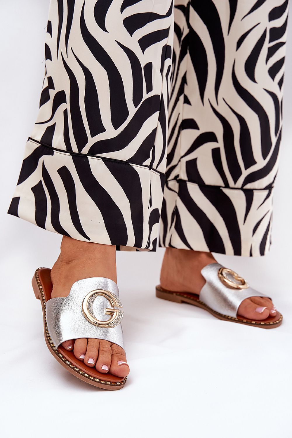 Elegant women's eco leather flip-flops by Step in Style, featuring a stylish design with decorative details, perfect for summer outfits and everyday comfort.