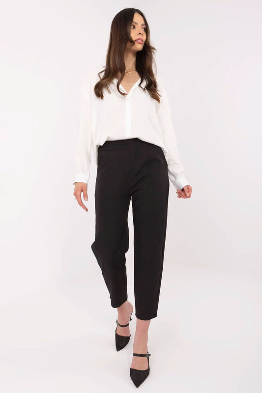 Elegant women's ochre cigarette trousers by Och Bella, featuring high waist design, smooth polyester fabric, and a tailored fit for a sophisticated silhouette.