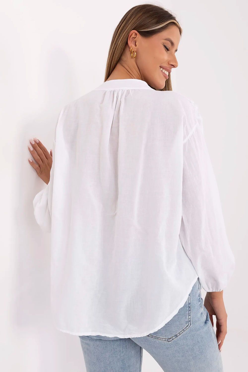 Elegant Och Bella boho style cotton blouse featuring long puffy sleeves and a v-neck, perfect for sophisticated casual wear. Available in sizes S, M, L, XL.