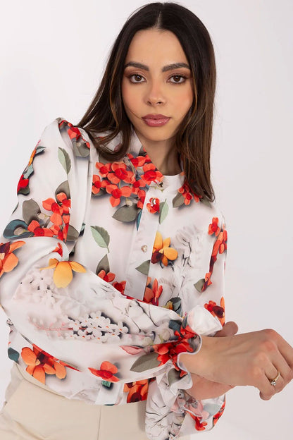 Timeless elegant shirt by Lakerta with a classic collar and elegant floral motifs, designed for women who appreciate fashionable refinement.