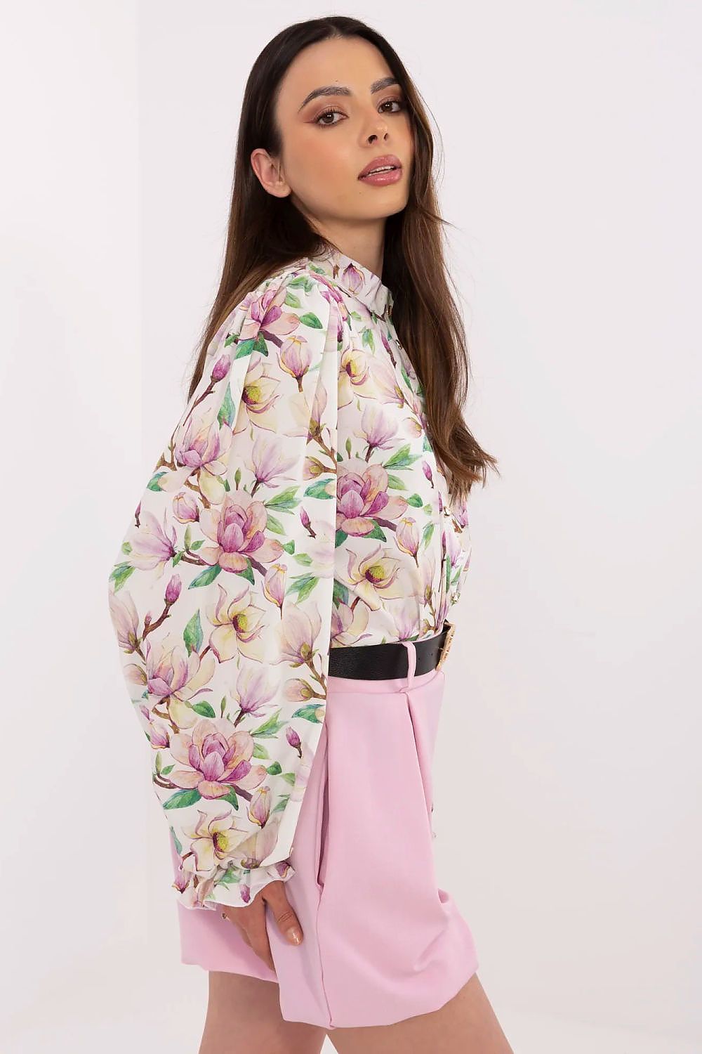 Close-up of feminine floral design on Lakerta's long sleeve shirt, embodying luxury and chic style for discerning women.