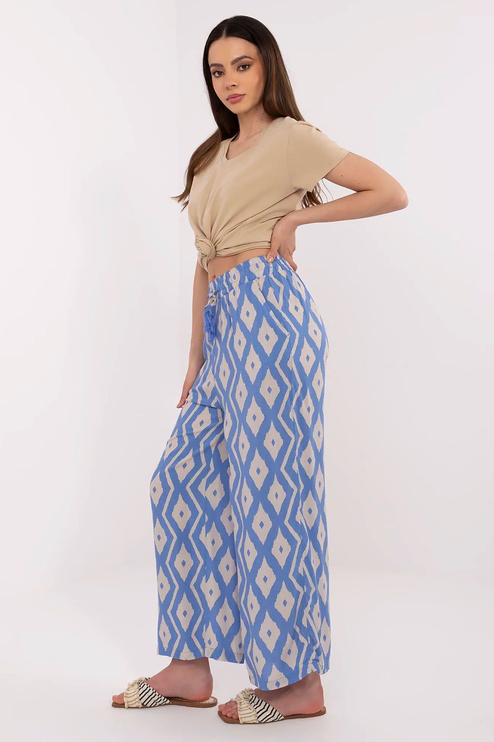 Chic women's trousers by Sublevel, high-waisted with wide legs and side pockets, ideal for a luxurious yet casual look.