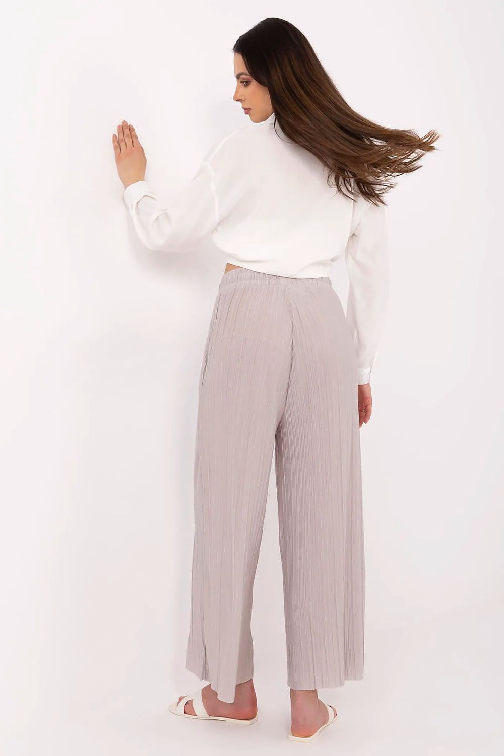 Chic women's wide-leg high-waist trousers from Sublevel, designed for comfort and modern sophistication, perfect for both casual outings and professional settings.