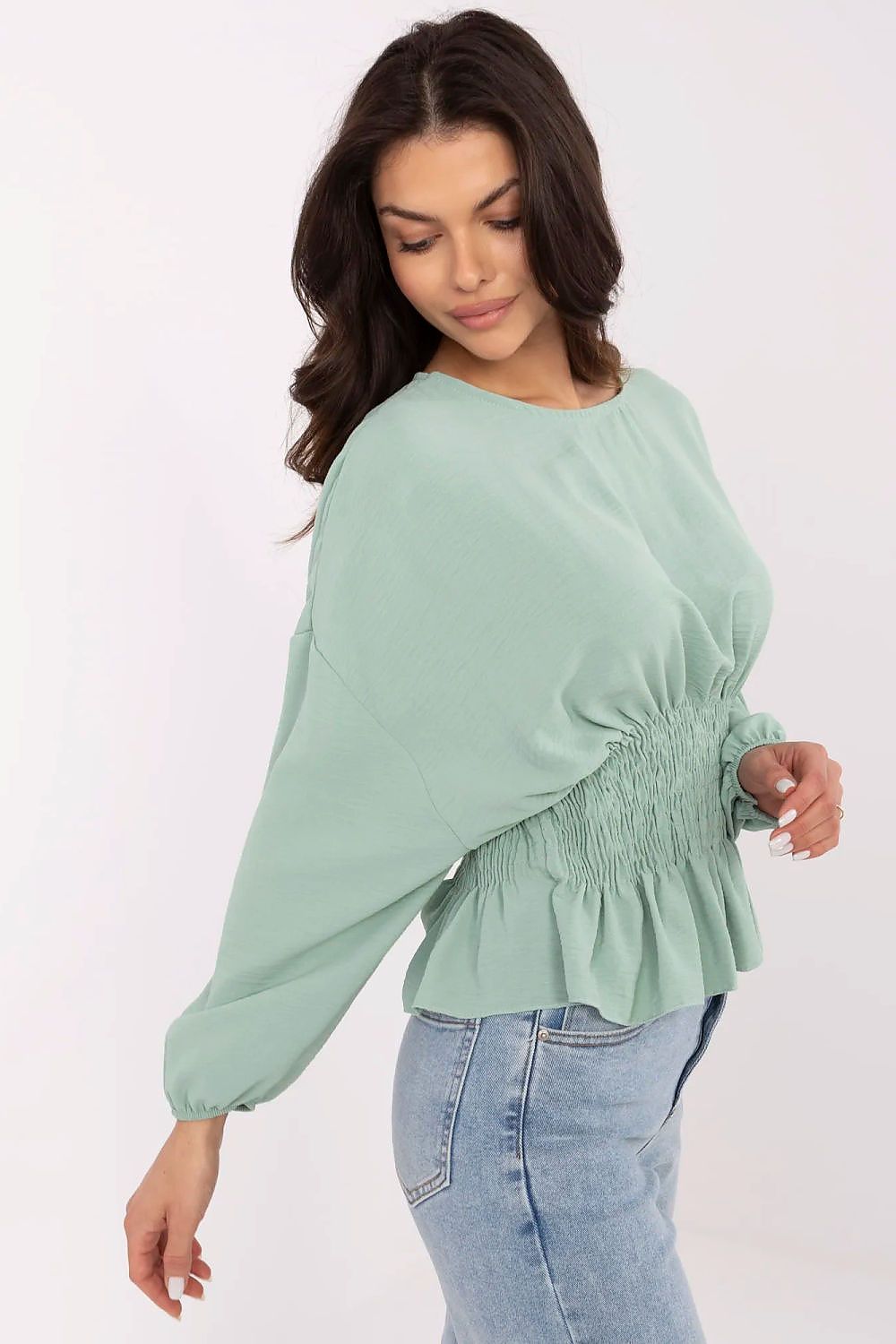 Close-up view of Sublevel's elegant women's polyester blouse showcasing the luxurious texture and feminine silhouette.