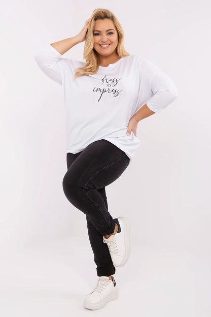 Chic plus size blouse from Relevance, featuring a classic round neckline and ideal for pairing with jeans or skirts for a stylish look.