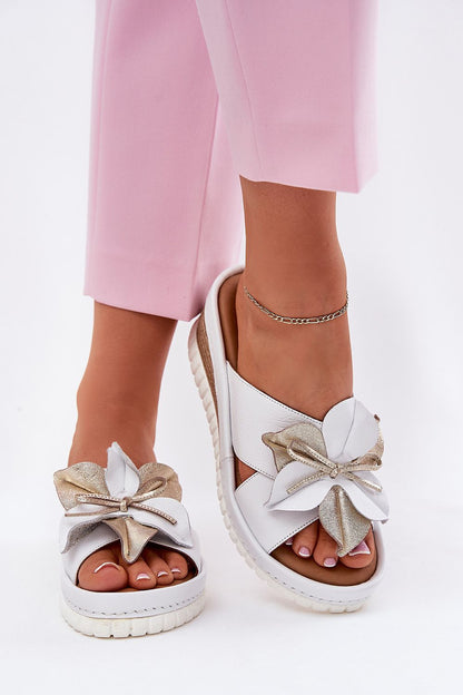 Step in Style Luxury Women's Natural Leather Wedge Flip-Flops featuring elegant flower detail and comfortable soft insole, sizes EU 36-41.