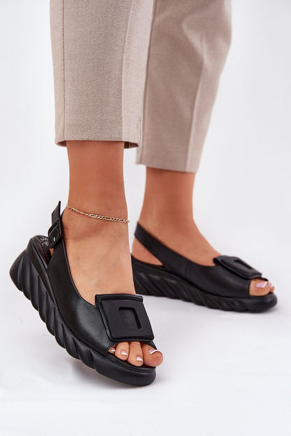 Sophisticated women's wedge sandals featuring a stunning buckle, made with natural leather, exclusively by Step in Style for timeless elegance.