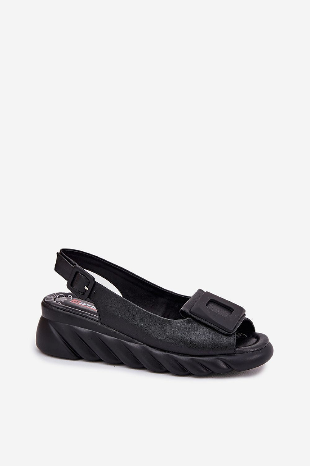 Exquisite women's natural leather sandals on a stylish wedge heel, designed by Step in Style, perfect for enhancing summer outfits.