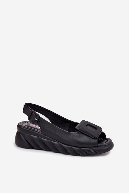 Exquisite women's natural leather sandals on a stylish wedge heel, designed by Step in Style, perfect for enhancing summer outfits.