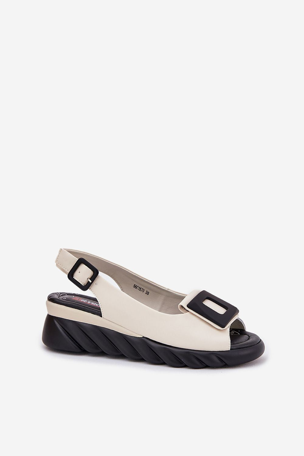 Women's elegant natural leather wedge sandals showcasing intricate front decoration by Step in Style, suitable for special occasions and everyday wear.