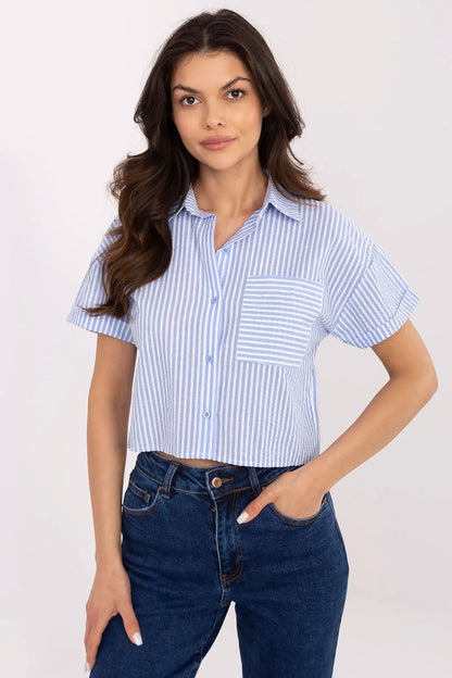 Close-up of the exquisite fabric and classic collar of the women's luxury striped shirt by NM, designed for comfort and elegance.