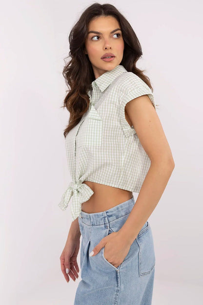 Sophisticated casual women's shirt by NM, featuring a contemporary design with a checkered pattern and a youthful character.