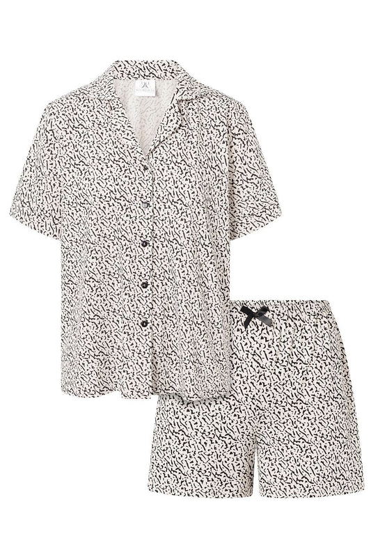 Luxury Women's Cotton Pyjamas Set by Momenti Per Me featuring a short sleeve V-neck shirt and shorts, designed for style and comfort in sizes S-XL.