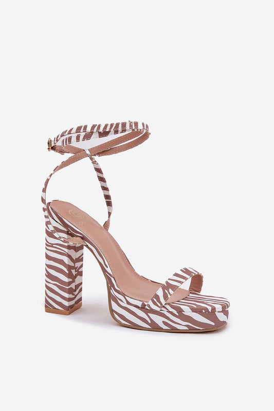 Elegant luxury women's heel sandals by Step in Style, featuring unique intertwined straps and a stylish design.