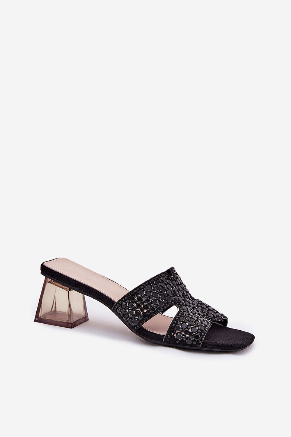 Close-up of Step in Style's elegant women's sandals, showcasing the exquisite detailing and transparent heel design for sophisticated summer elegance.