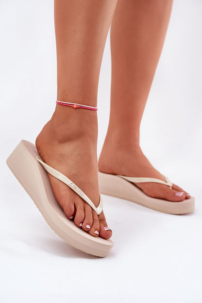 Luxury women's platform flip-flops by Step in Style in sizes EU 36-41, featuring an elegant design perfect for summer outings and beachwear.