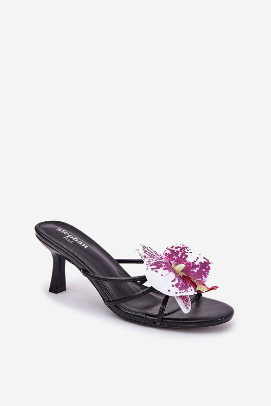Close-up of women's eco-leather sandals with orchid flower and 7 cm stiletto heel by Step in Style, perfect for enhancing sophistication at special occasions.