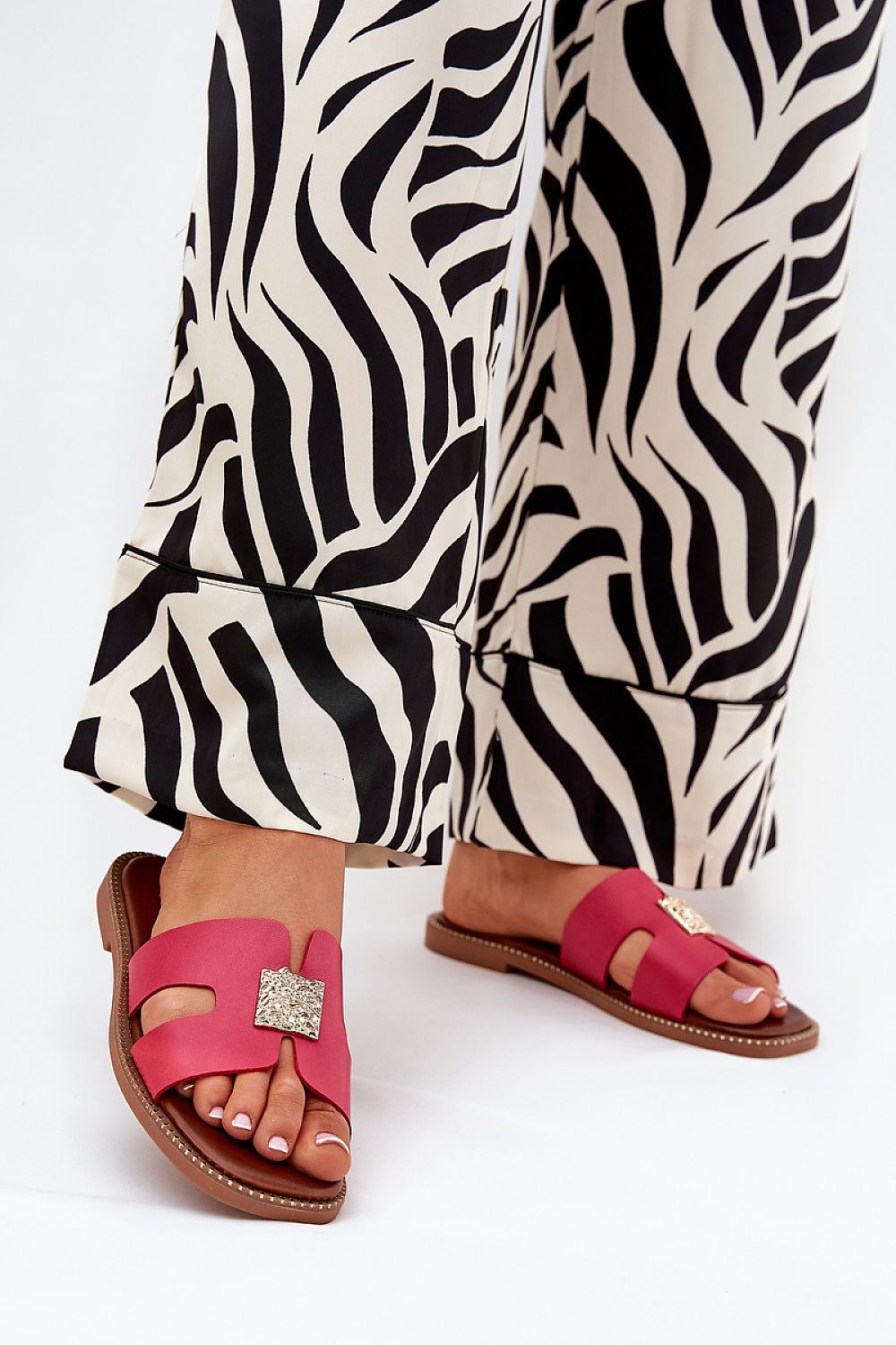 Elegant women's sandals from Step in Style, crafted from faux leather with chic cut-outs and a flat heel, perfect for summer wear.