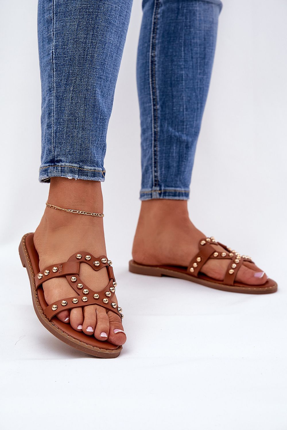 Close-up of luxurious eco-leather flat heel sandals by Step in Style, showcasing sophisticated cutout design ideal for warm weather wear.