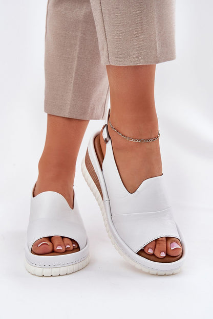 Elegant women's wedge sandals crafted from natural leather by Step in Style, featuring an adjustable buckle for a custom fit.