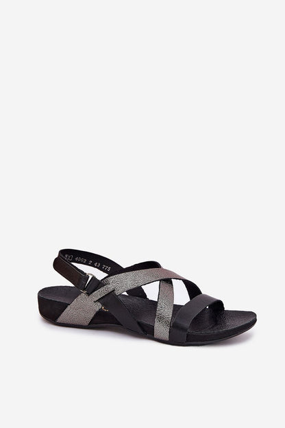 Close-up view of Step in Style women's leather sandals showcasing velcro fastening and durable natural leather material.
