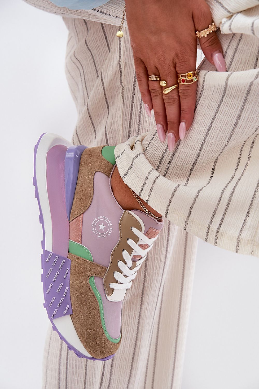 Stylish women's sneakers from Step in Style, featuring a refined suede finish and HI-POLY system for ultimate shock absorption and comfort.