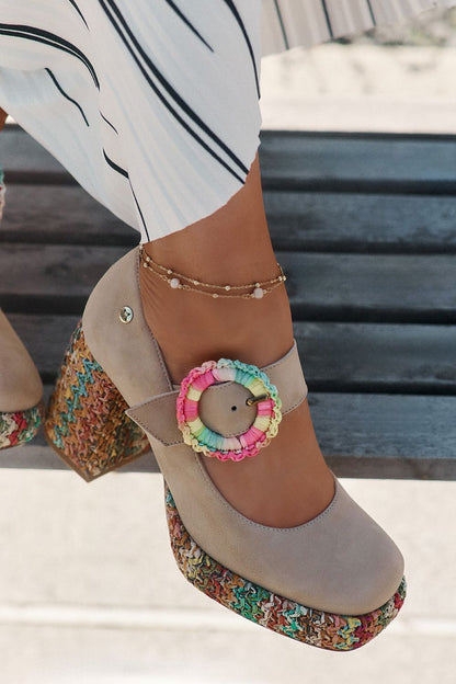 Close-up of the luxurious suede texture of women's block heel pumps from Step in Style, showcasing the decorative braid and stylish adjustable strap.