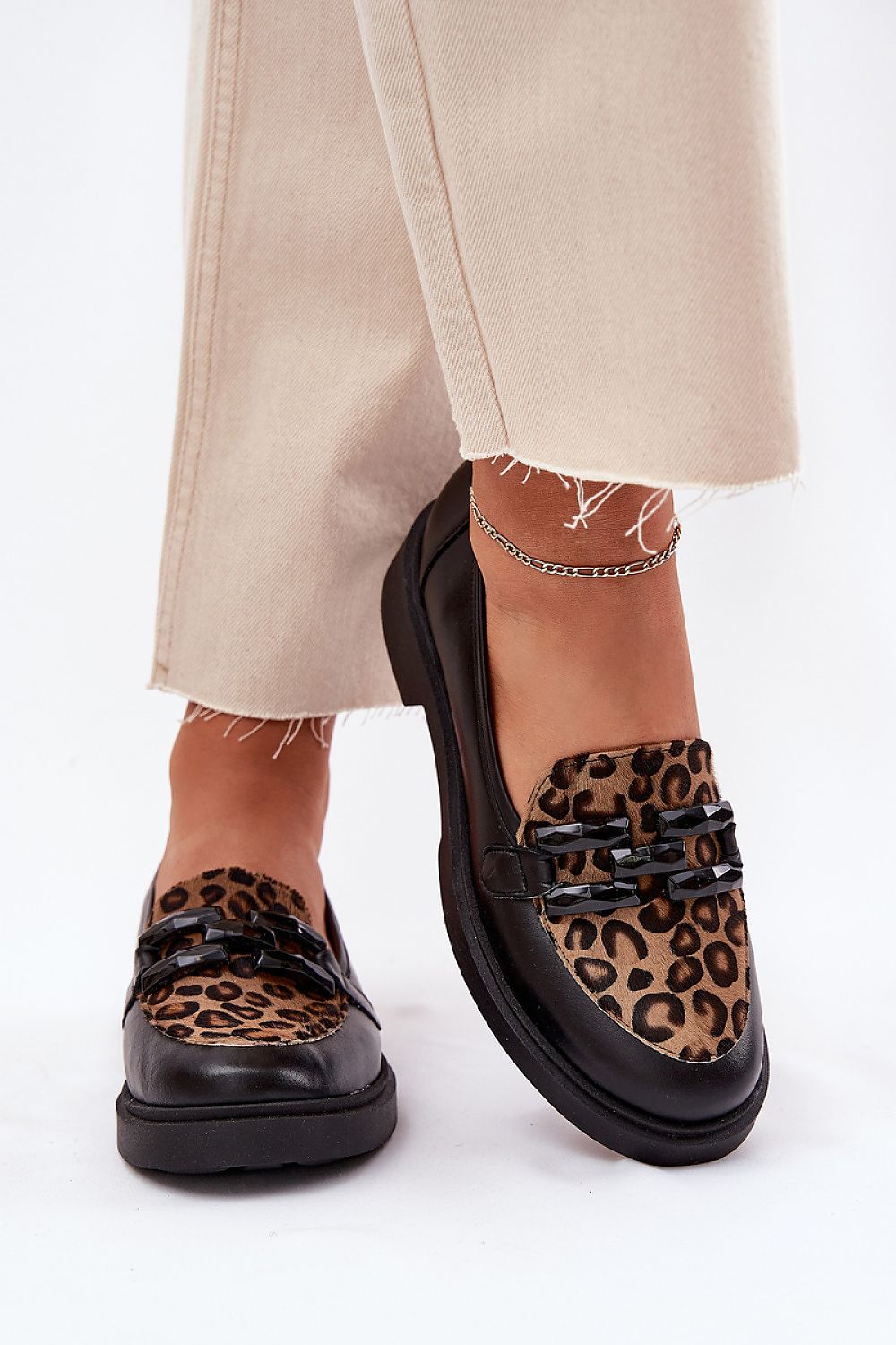 Comfortable and elegant women's loafers featuring a trendy leopard print design, crafted from premium natural leather by Step in Style.