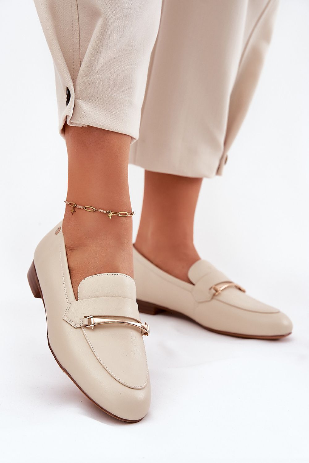 Luxury Maciejka women's loafers in natural leather with elegant golden detail, perfect for sophisticated styling.
