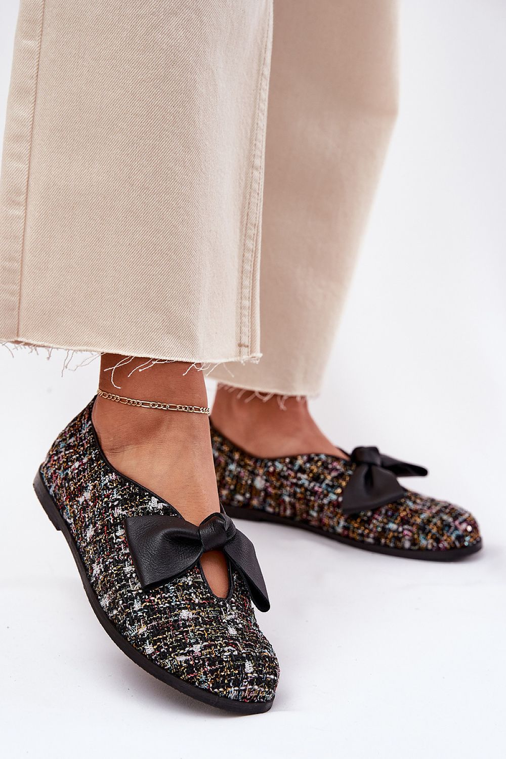 Elegant women's ballet flats by Step in Style featuring a charming bow detail, crafted from natural leather and textile, perfect for sophistication in everyday wear.