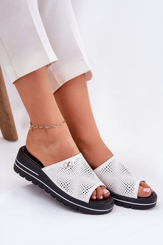 Luxury women's leather wedge sandals in elegant design by Step in Style, showcasing stylish craftsmanship and comfort for summer wear.