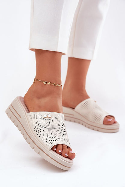 Fashionable women's leather wedge sandals in various sizes from Step in Style, designed for comfort and elegance on warm days.