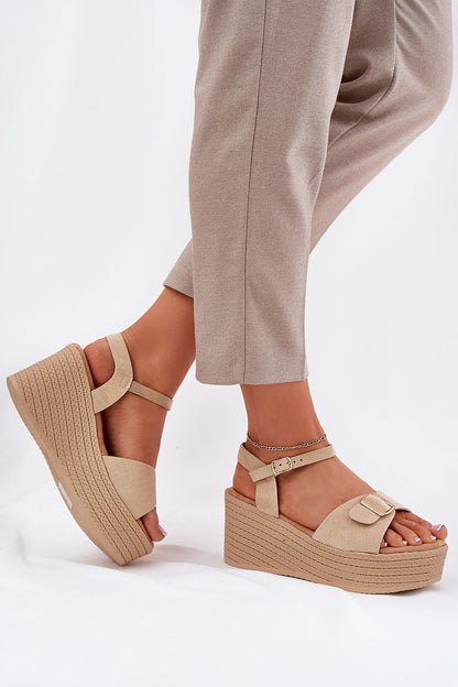 Stylish women's eco suede sandals with decorative buckle and braided imitation platform, designed for luxury and comfort by Step in Style.