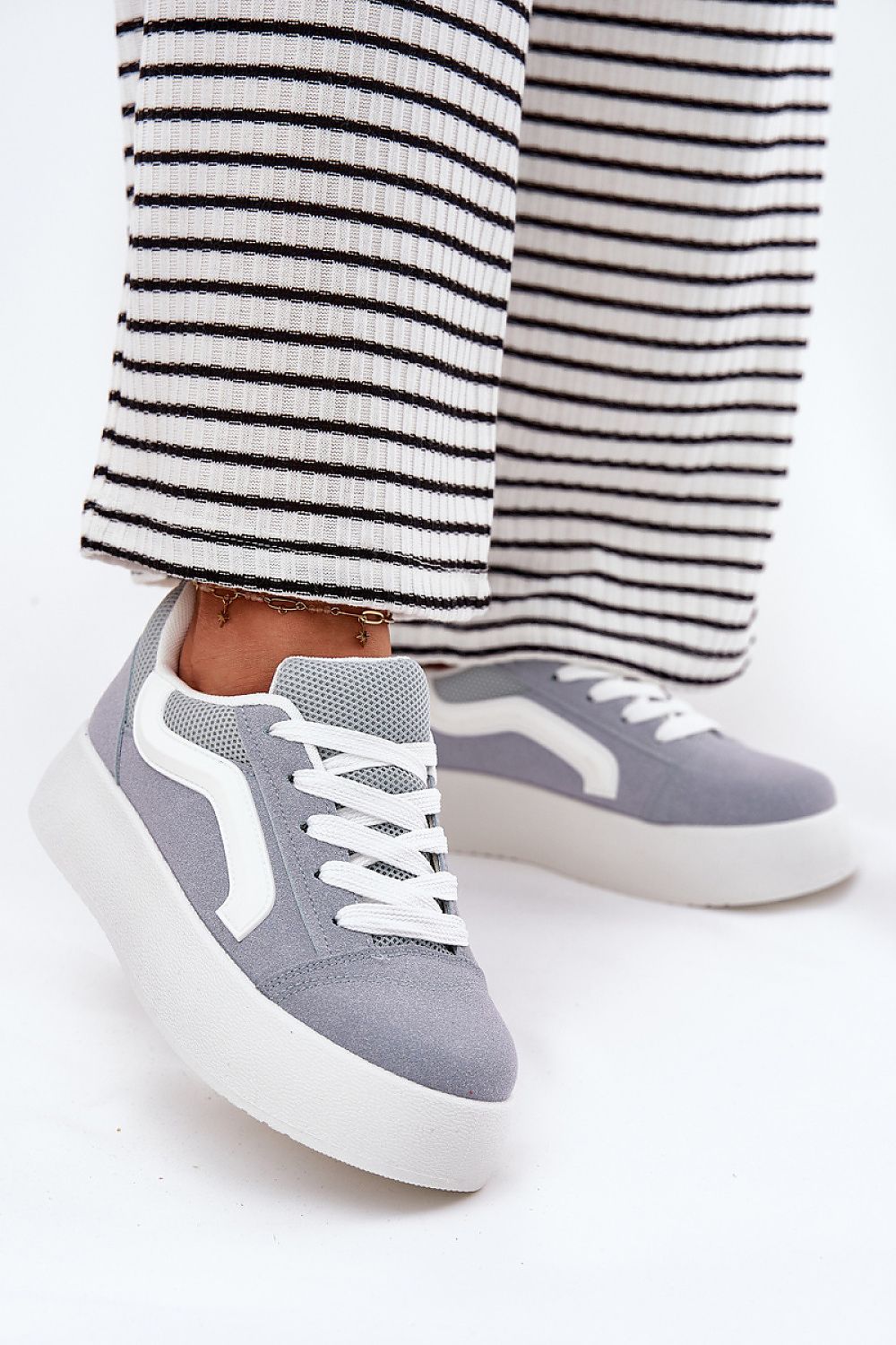 Elegant Women's Suede Platform Sneakers by Step in Style, combining comfort and sophistication for everyday wear.