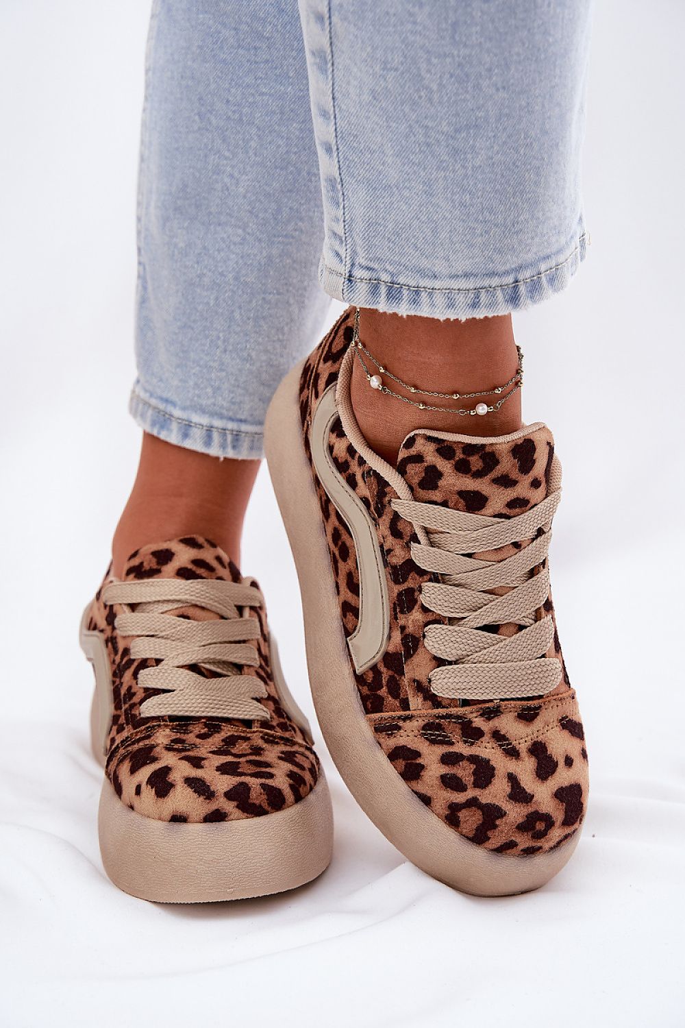 Elegant women's suede platform sneakers from Step in Style, showcasing a chic design perfect for casual wear.