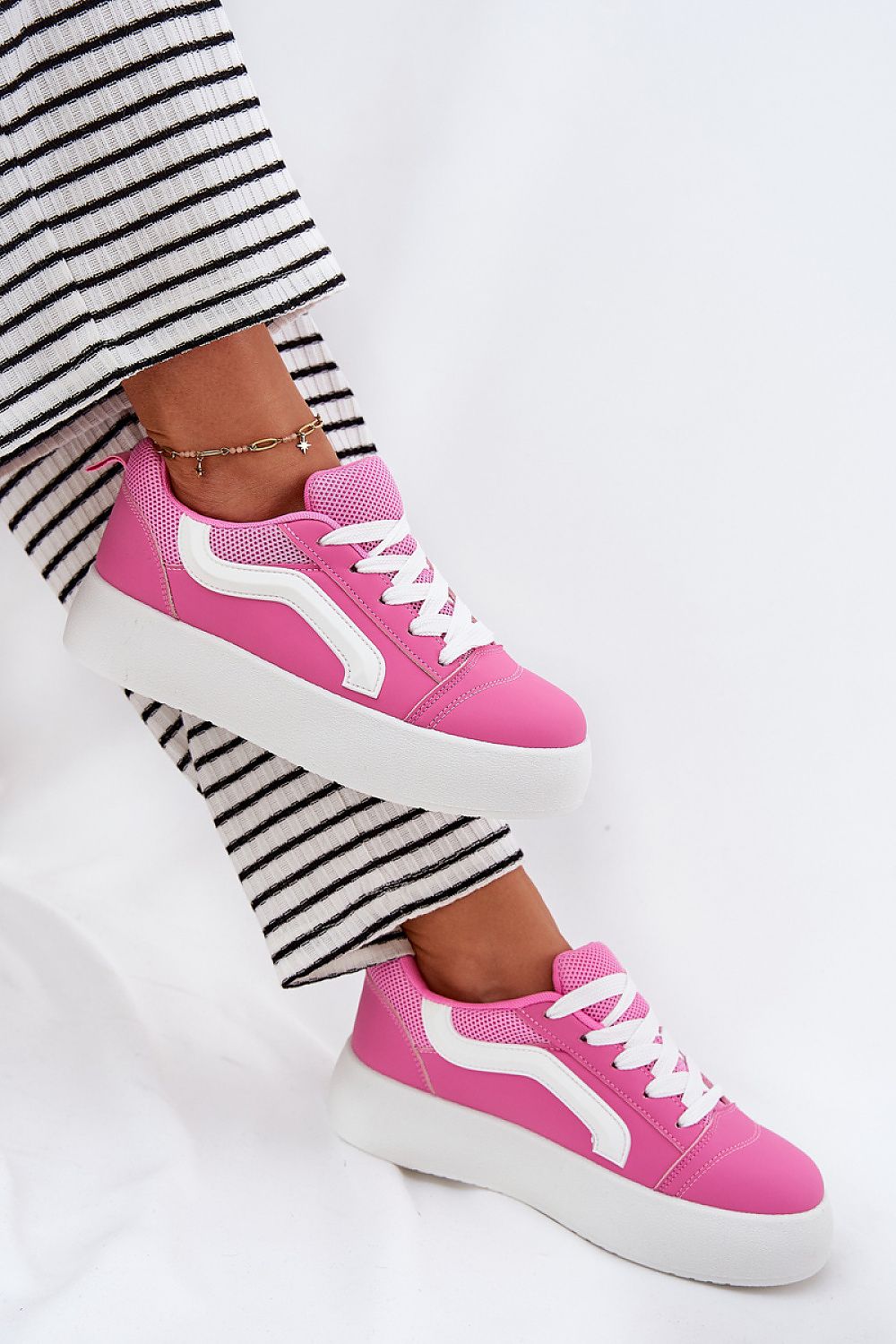 Fashionable women's platform sneakers from Step in Style, designed with a trendy silhouette and plush insole for all-day wear.